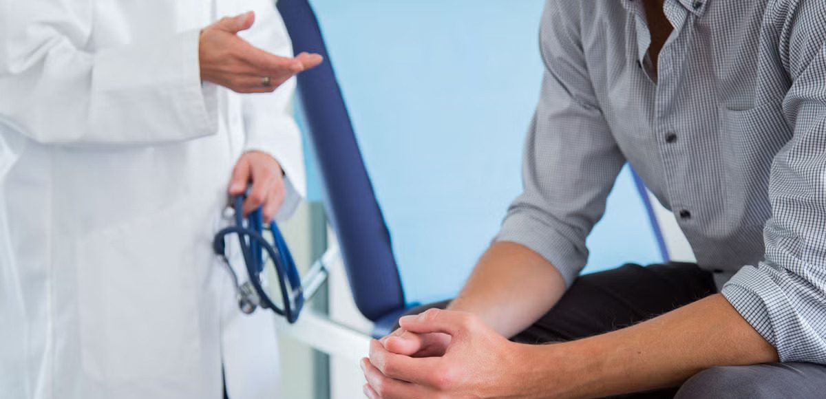 men consulting doctor about ED