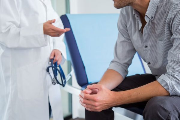 men consulting doctor about ED